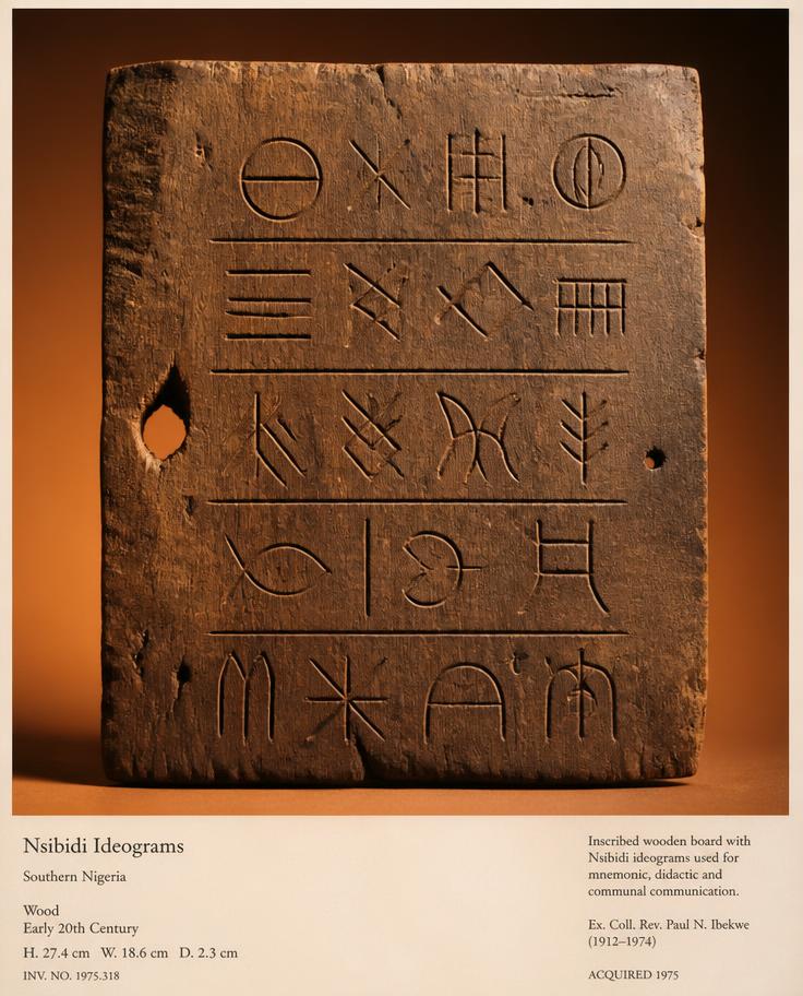Wooden plank carved with Nsibidi ideograms